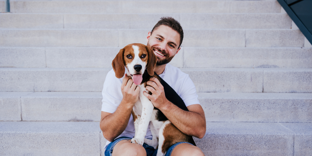 Man with dog on steps